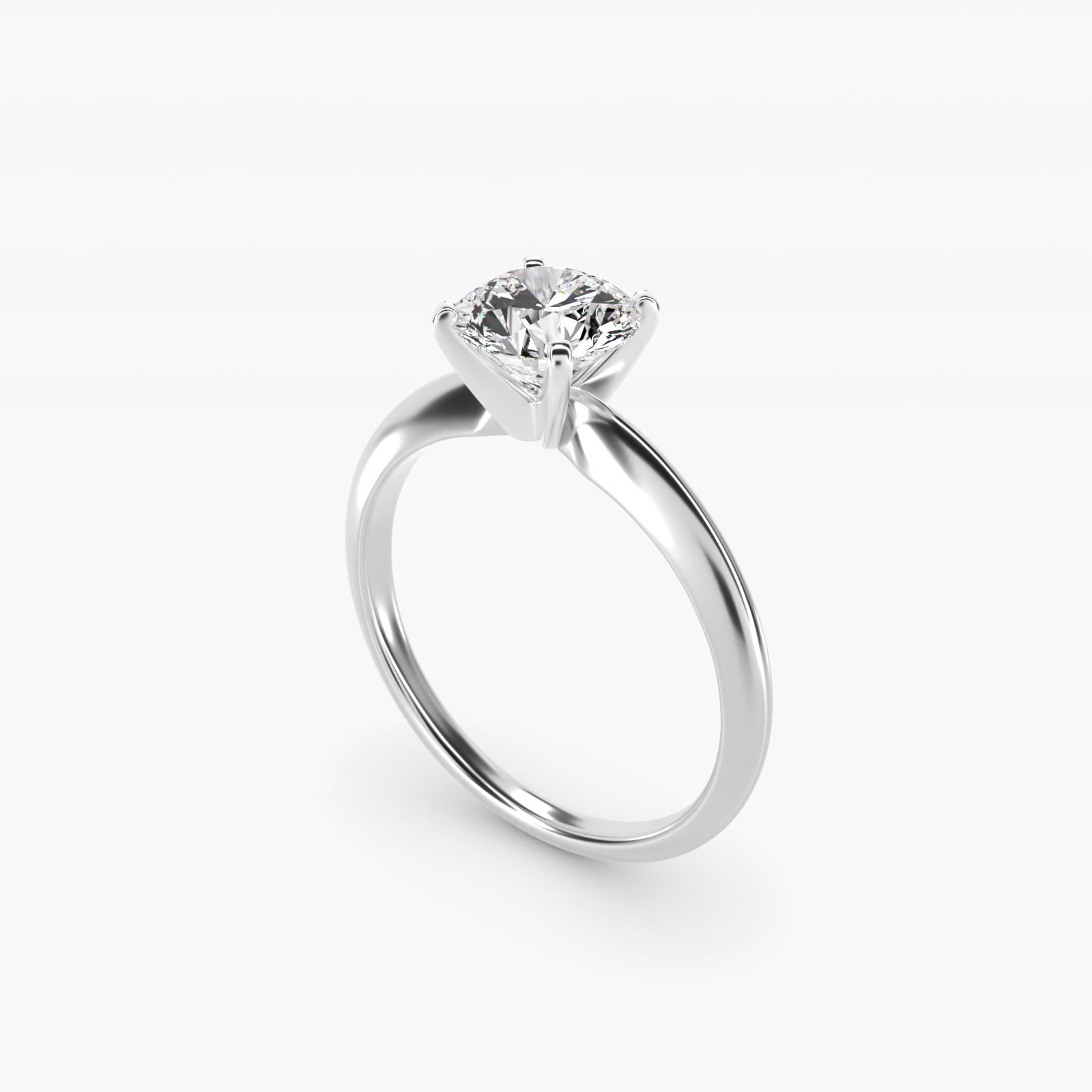 Classic four-prong solitaire engagement ring in 14K white gold with a round diamond