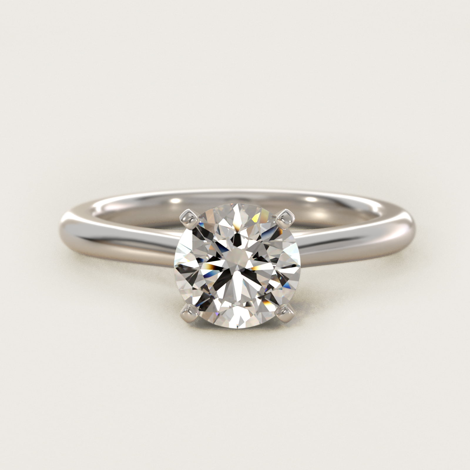 Petite solitaire engagement ring in 14K white gold with a round diamond center stone